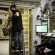 A French court told Amazon that it would not be allowed to deliver non-essential items until it resolved the safety concerns presented by unions. Above, an employee at an Amazon warehouse in France.